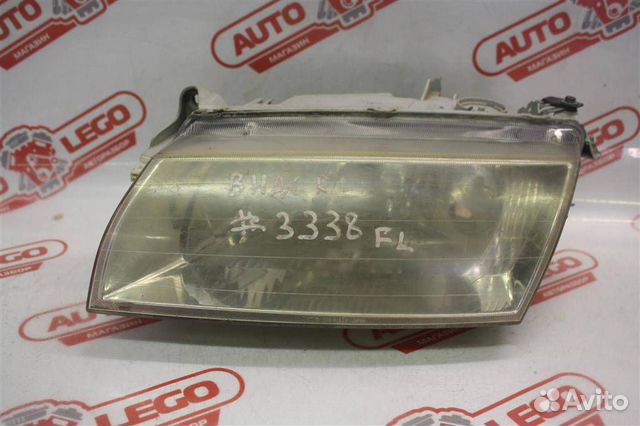 Фара левая Mazda Familia BH (1994 - 1998)