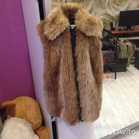 Меховая жилетка Меховая жилетка