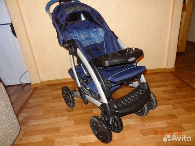 Детская коляска Graco Quattro Tour Deluxe Детская коляска Graco Quattro Tour Deluxe