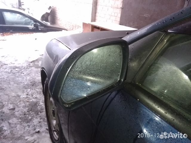 Зеркало боковое левое заднего вида Киа Спектра Зеркало боковое левое заднего вида Киа Спектра