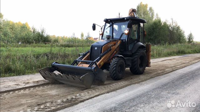 Экскаватор-погрузчик. Трактор
