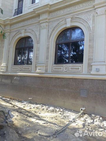 Облицовка фасада натуральным камнем. Строительство