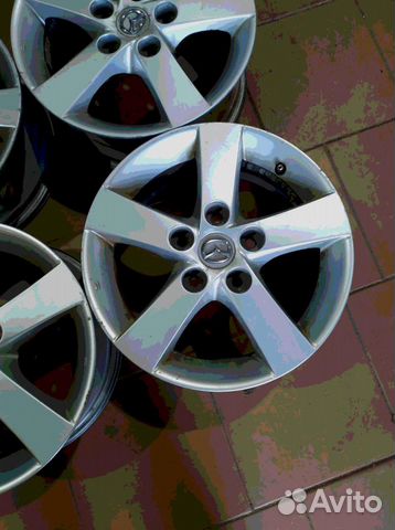 Диски бу литые R15 LU на Mazda