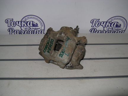 Суппорт передний левый Toyota Corolla verso E120