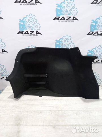 Обшивка багажника левая Kia Rio 4