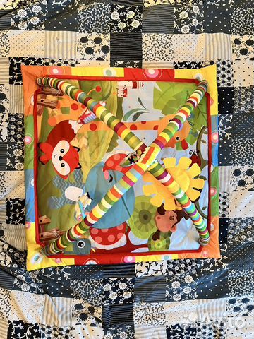 Развивающий игровой коврик для малыша