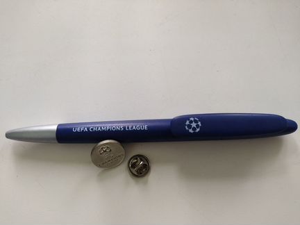 Ручка и значок Лиги Чемпионов
