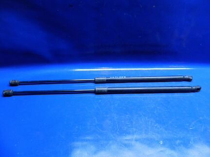 Амортизатор крышки багажника Опель Корса Д купэ