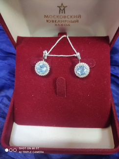 Серьги 585 пробы с голубыми вставками