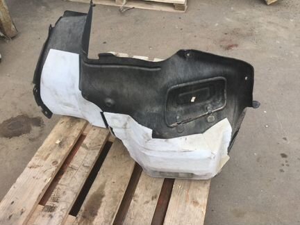 Обшивка багажника левая KIA RIO 857304Y000WK