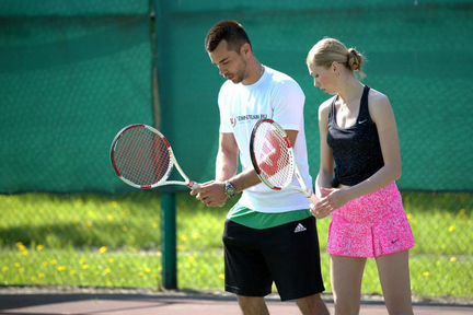 Тренер по большому теннису