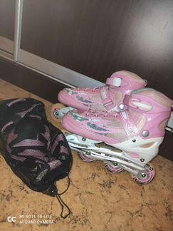 Ролики женские хорошие, в комплекте с наколенникам